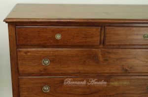 Reproduction of an antique chest of drawers handmade in planed and antiqued solid walnut wood